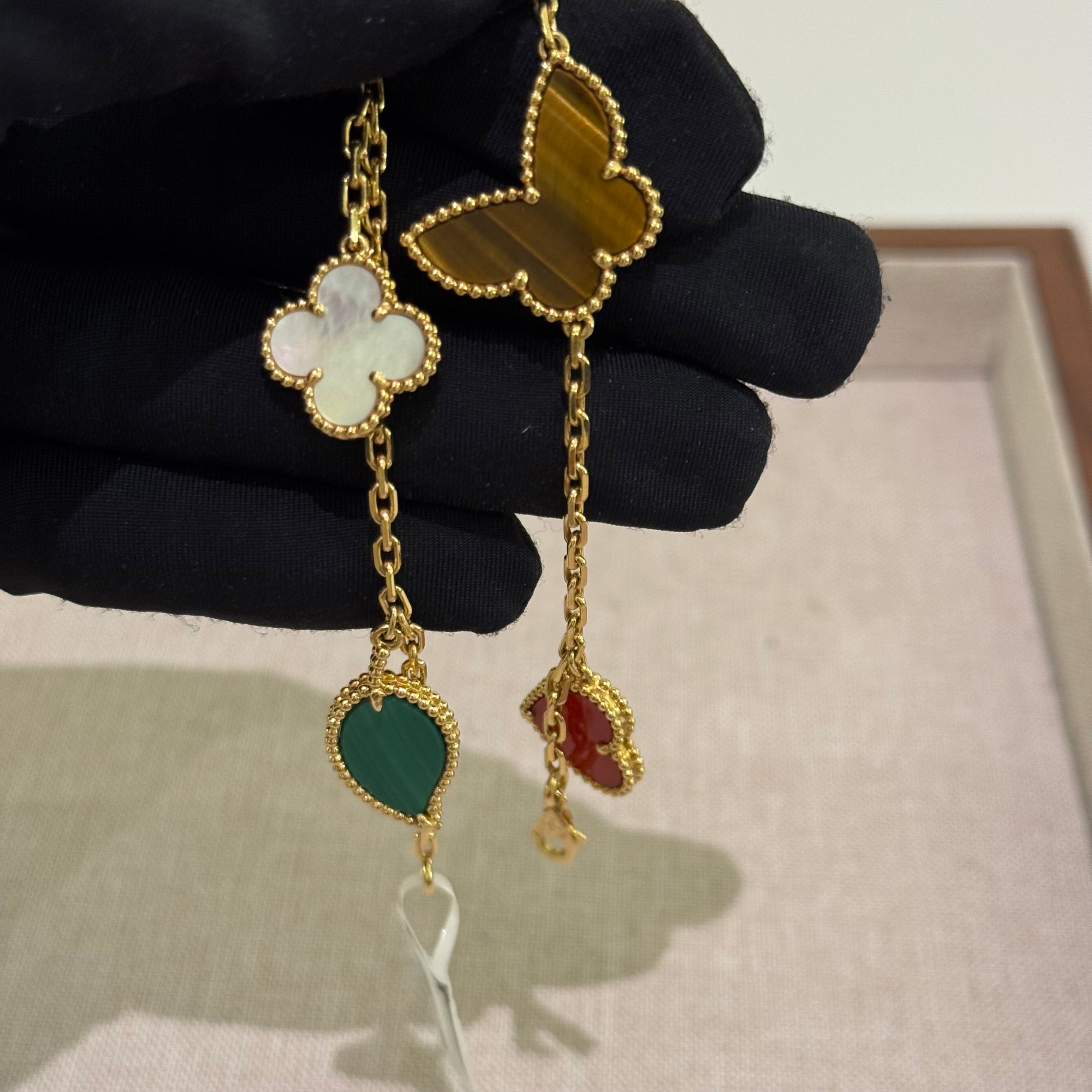 VAN CLEEF & ARPELS LUCKY ALHAMBRA BRACELET 18K YELLOW GOLD WITH MOTHER-OF-PEARL, MALACHITE, CARNELIAN & TIGER’S EYE