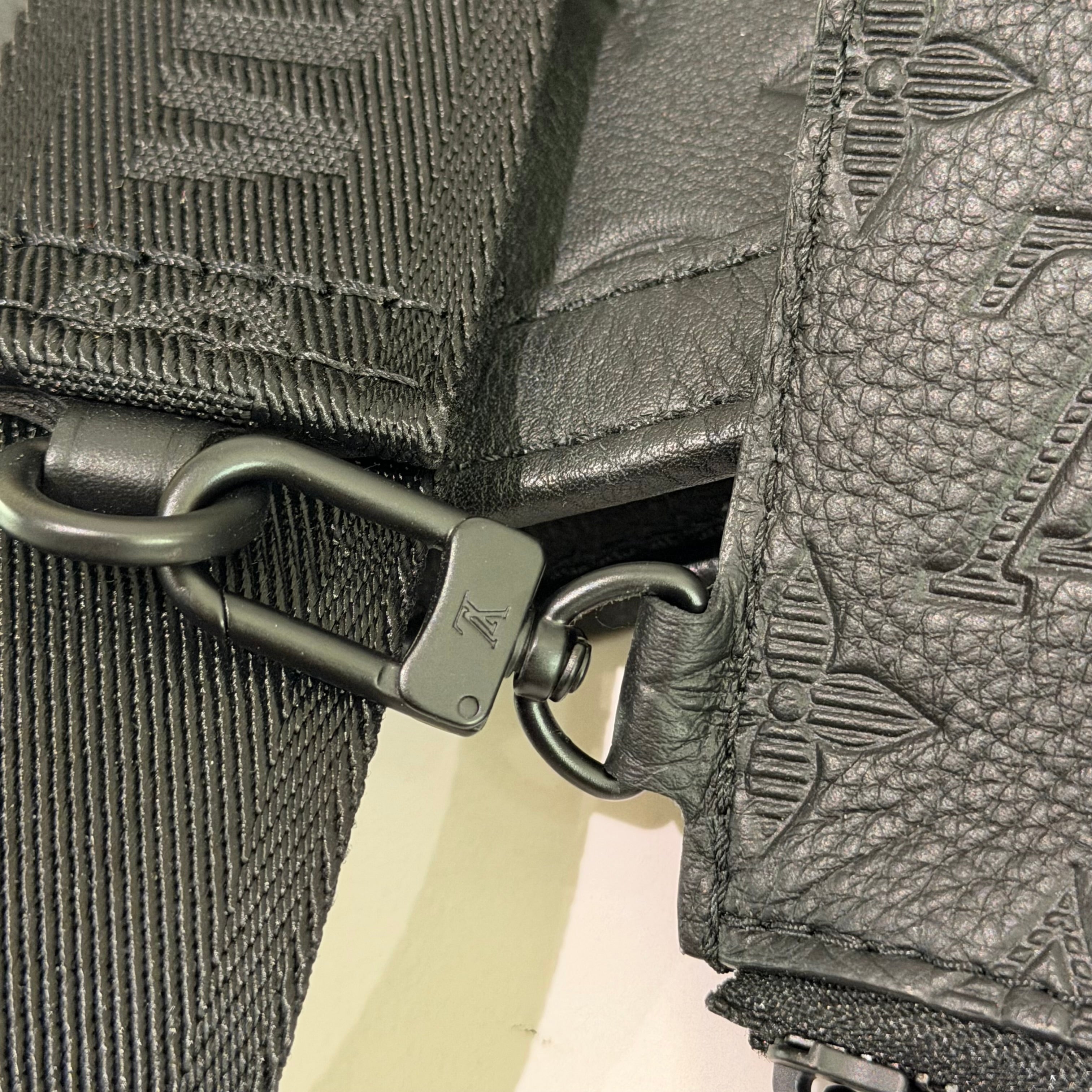 Louis Vuitton Gaston Wearable Wallet Embossed Leather Crossbody Bag