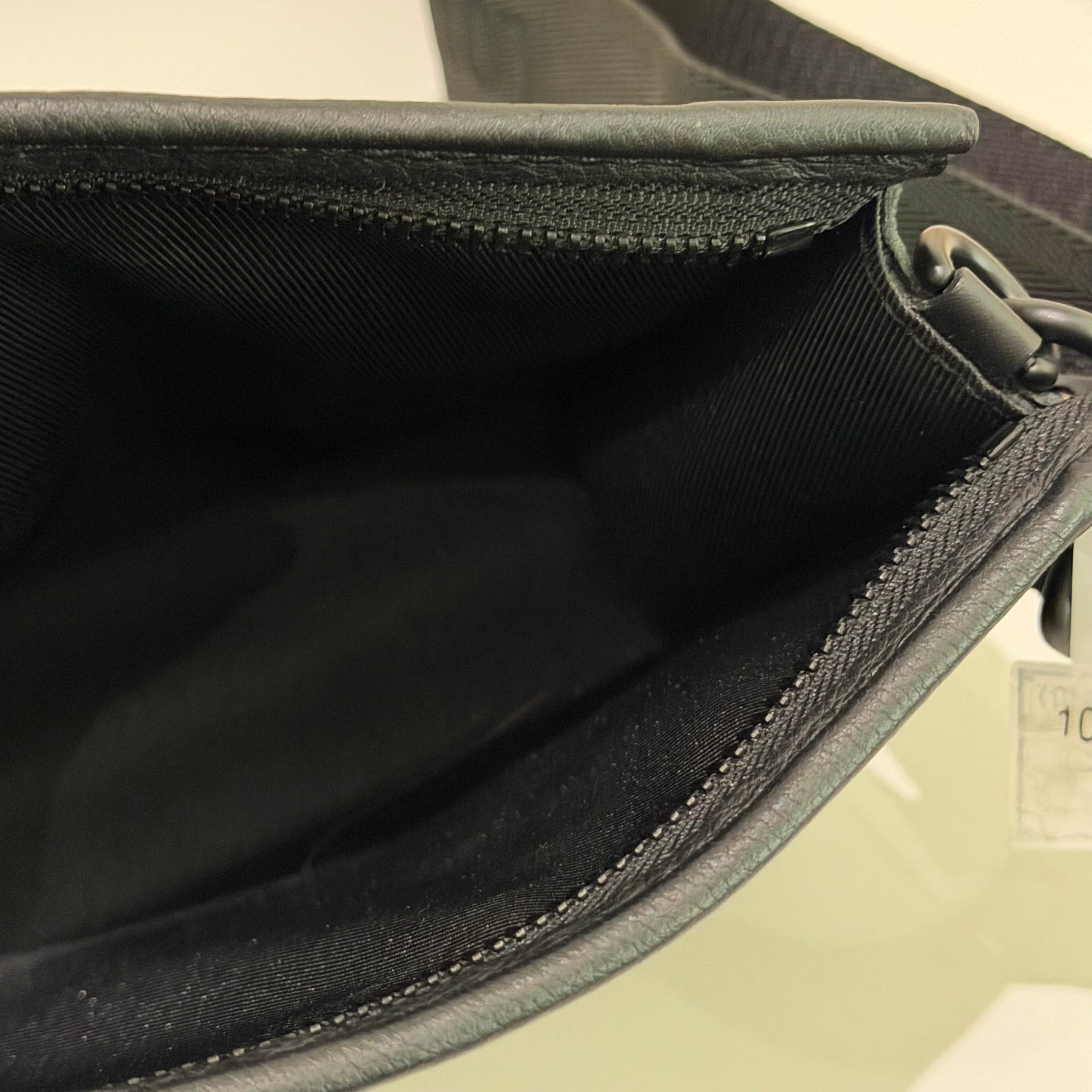 Louis Vuitton Gaston Wearable Wallet Embossed Leather Crossbody Bag