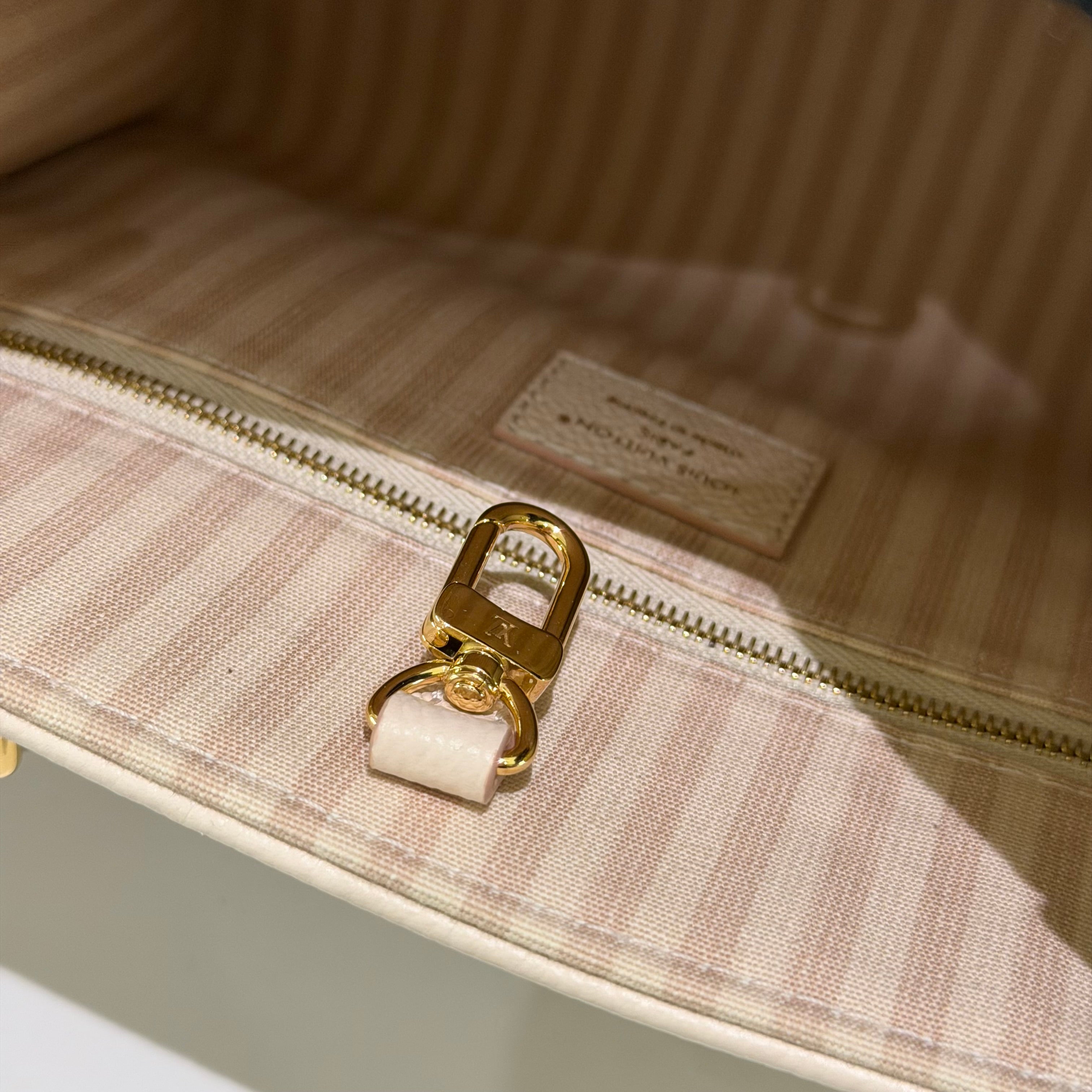 Louis Vuitton Onthego PM Almond Pink Monogram Empreinte Leather (Chip Model)