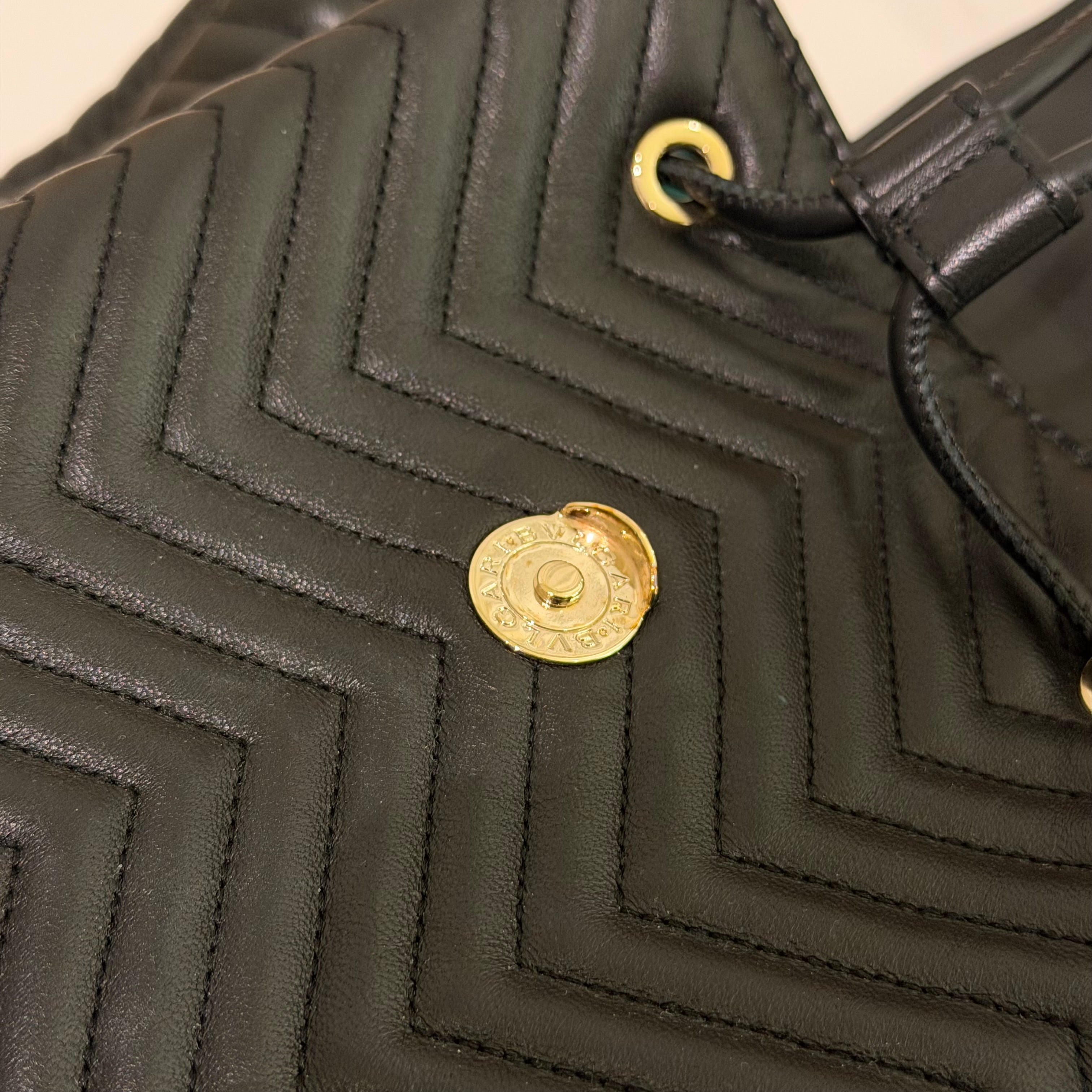 Bvlgari Serpenti Forever Black V-Quilted Enamel Snakehead Backpack | BVLGARI