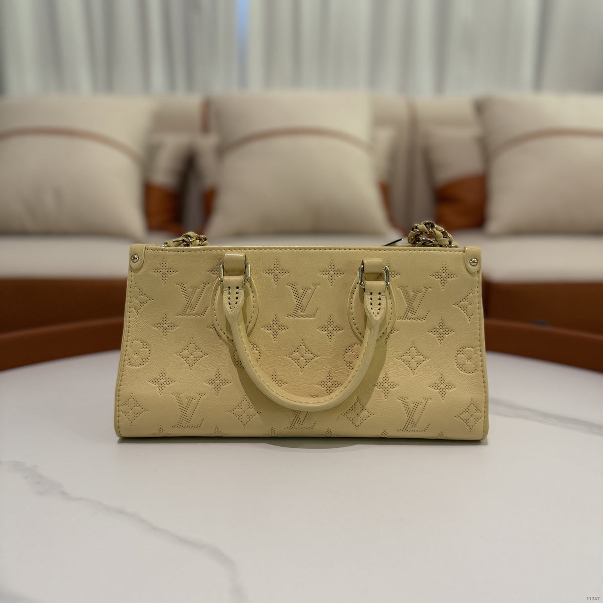 Louis Vuitton Onthego East West Cream Yellow Monogram Embossed Tote | LOUIS VUITTON