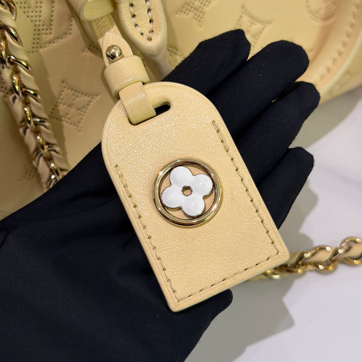 Louis Vuitton Onthego East West Cream Yellow Monogram Embossed Tote | LOUIS VUITTON